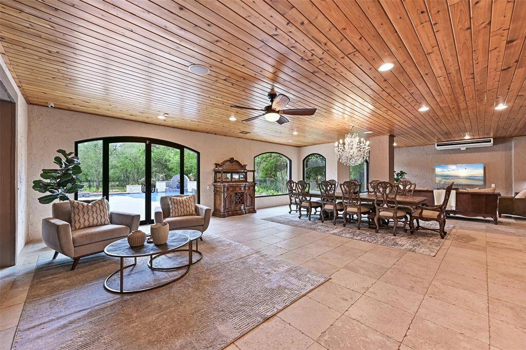 Downstairs, an elaborate 40x40 game room that has endless possibilities of use and enjoyment. From formal dining, to parlor area, game room spaces and more, there is room to enjoy this incredible space in various ways.