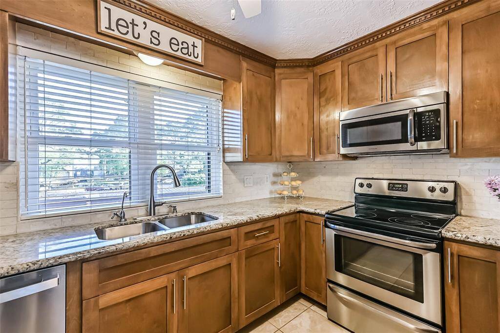 Cabinets to the ceiling for plenty of storage