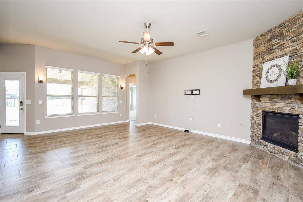 Floor to ceiling stone fireplace