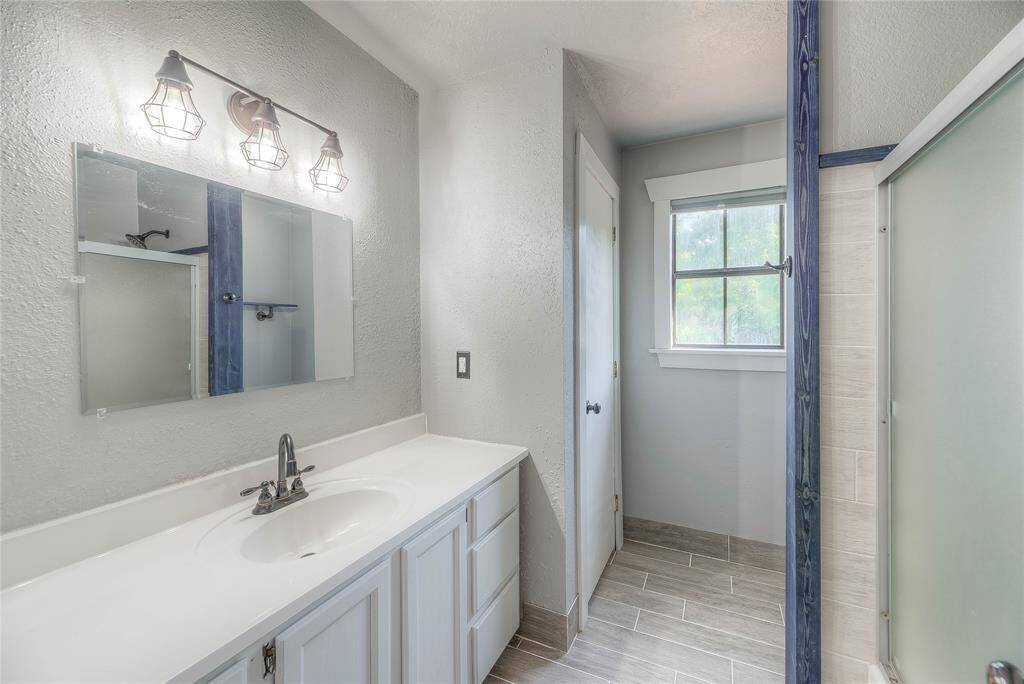 Tastefully renovated Secondary bath upstairs; tub/shower combo