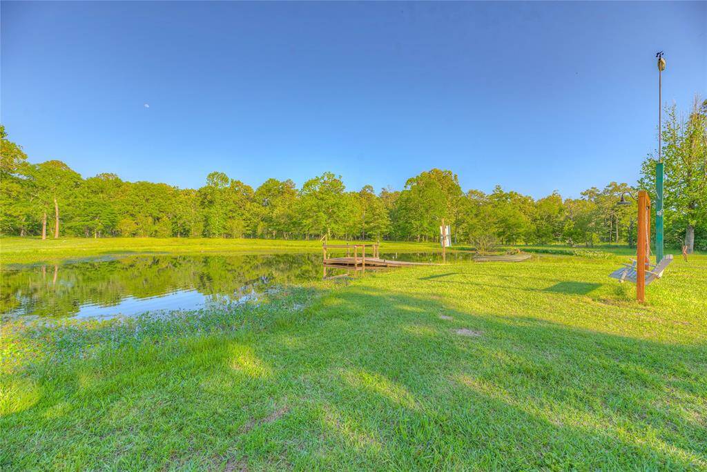 Fully stocked pond with bass, crappie, catfish & perch. Has a pier and flat bottom boat with trolling motor that solar charges.