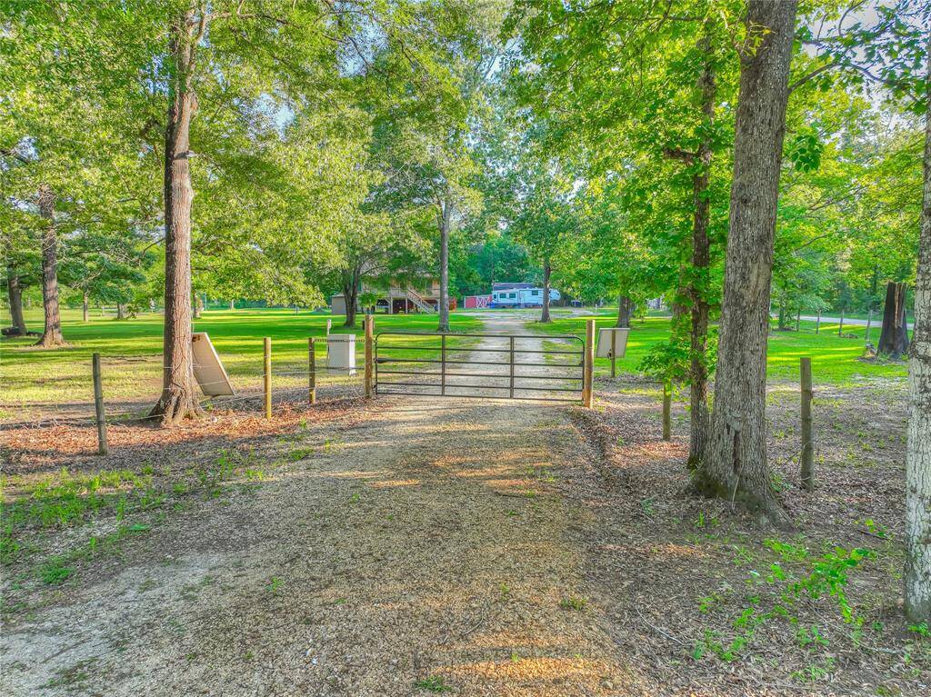 One of 2 solar powered gates into the beautiful property.