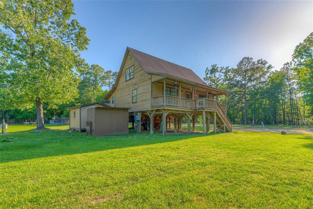 Front of home with office & well shed and rv hook ups