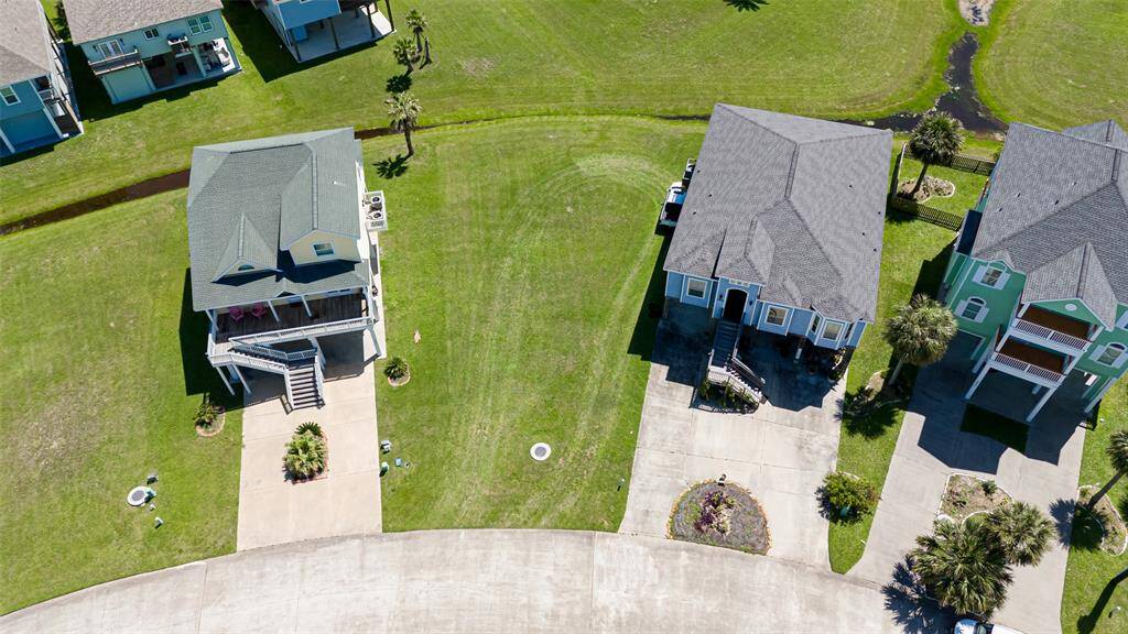 Hovering above, this view captures the lot’s generous proportions and remarkably even surface—an ideal footprint for future development.