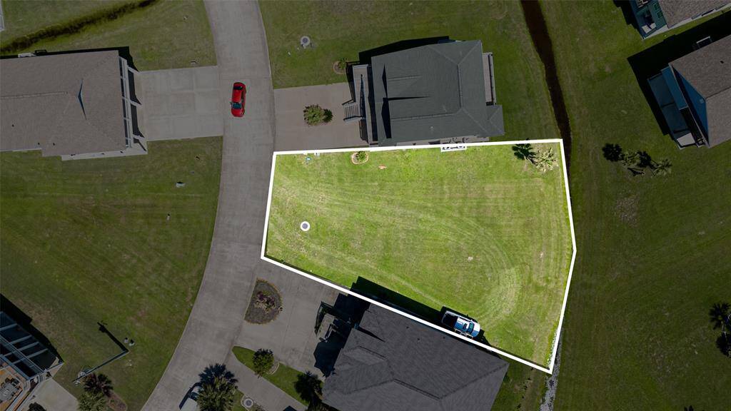 This flat top-down aerial provides a crystal-clear outline of the lot, revealing its shape, orientation, and potential.