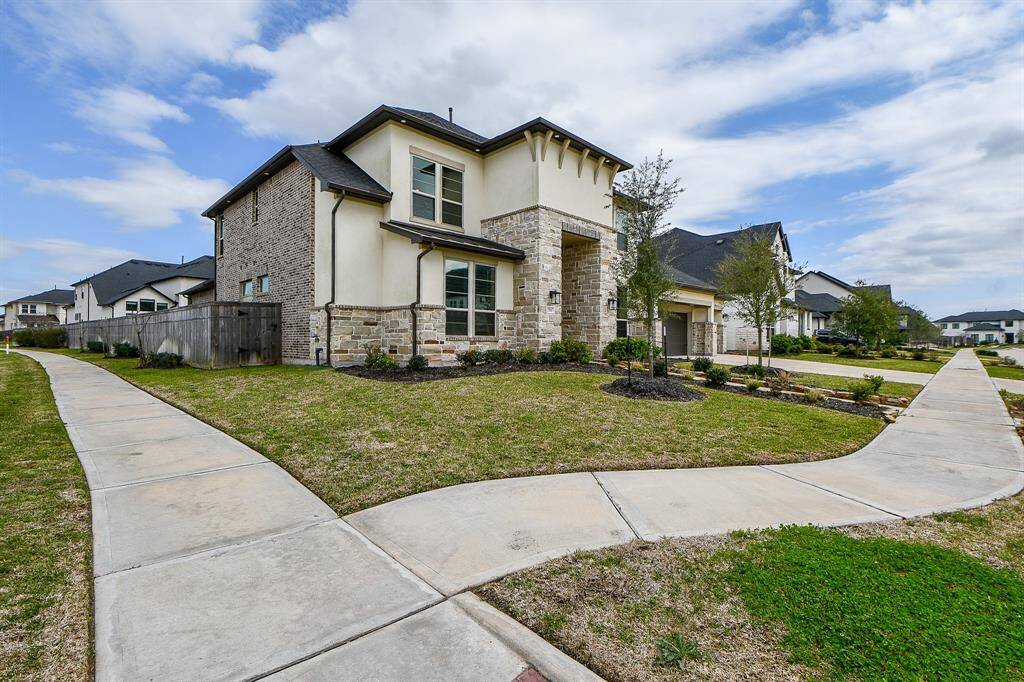 Notice the beautiful Stucco Stone Facade.