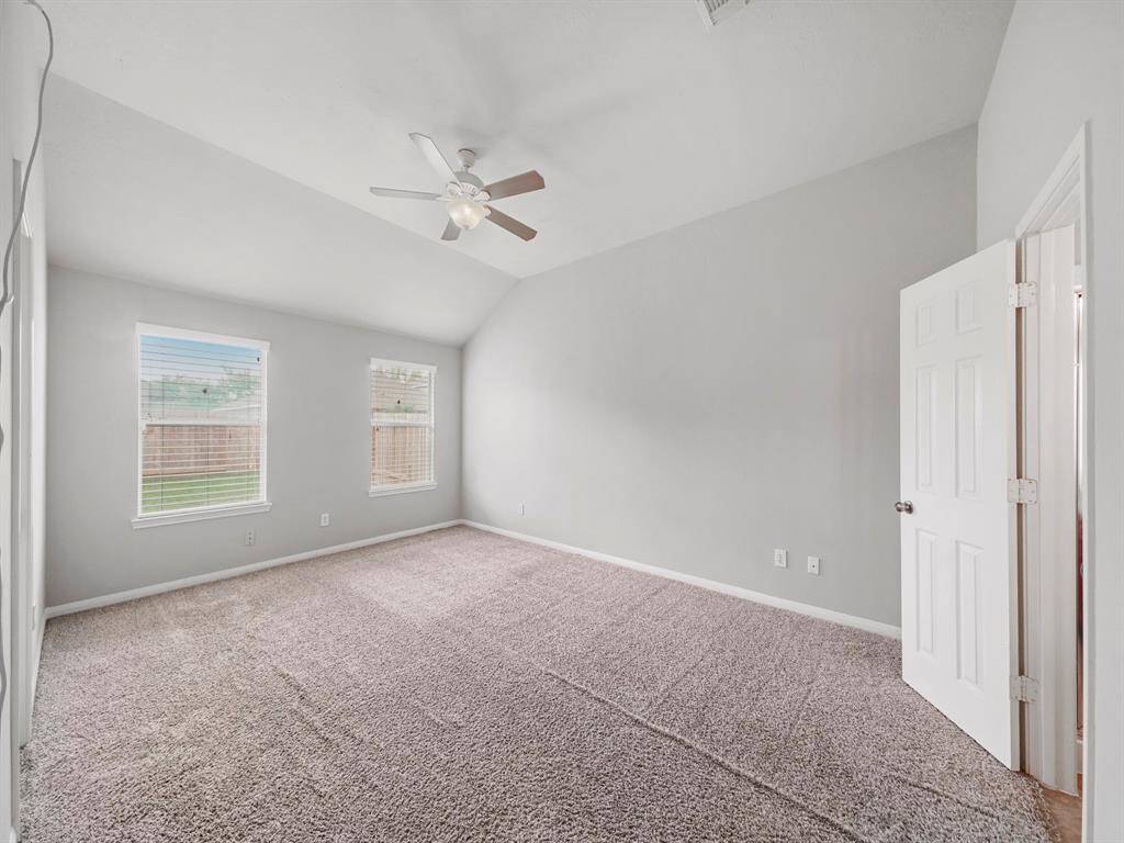 Primary BR - on to the right is en suite Bathroom, left of the room is a huge walk-in closet.