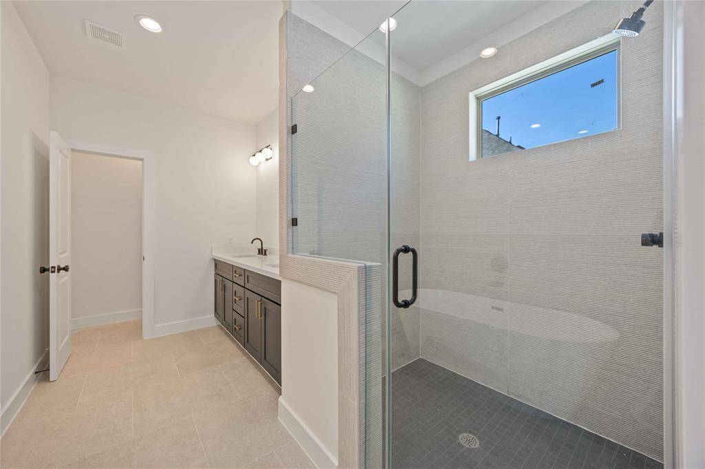 Primary bath with walk in shower and double vanity