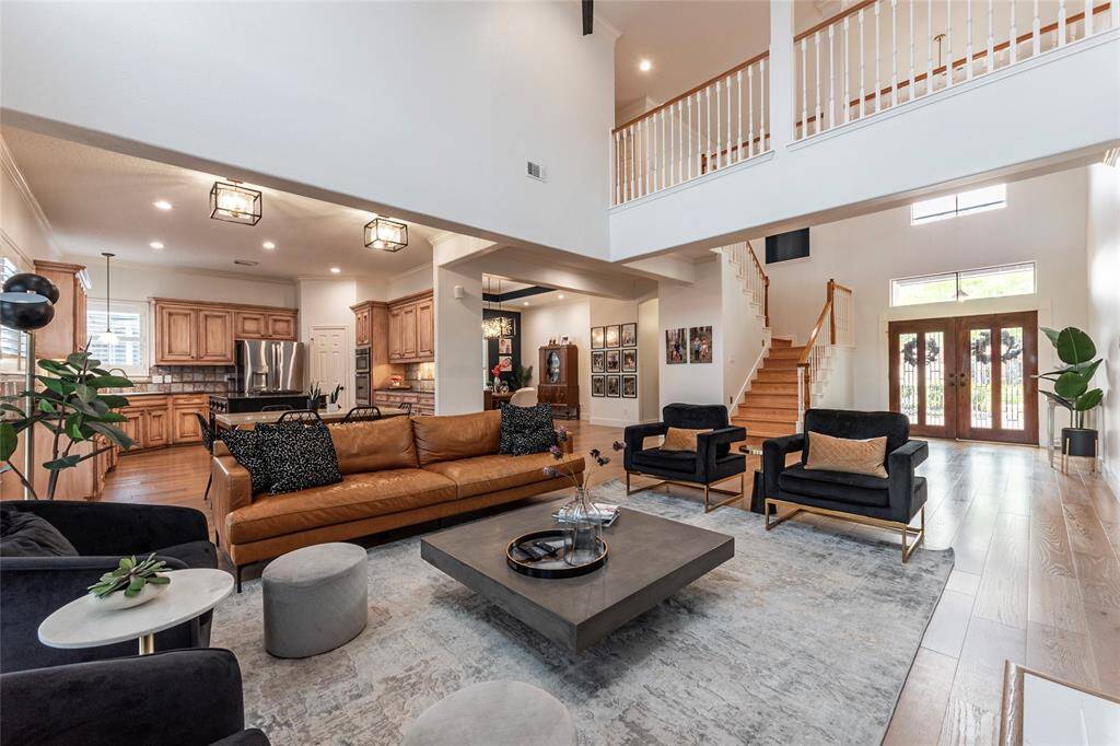 High ceilings, open floor plan, and lots of natural light in this gorgeous home