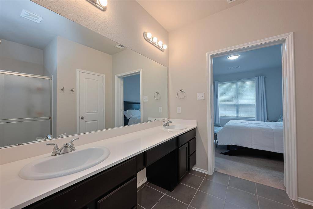 Primary bathroom with double vanities