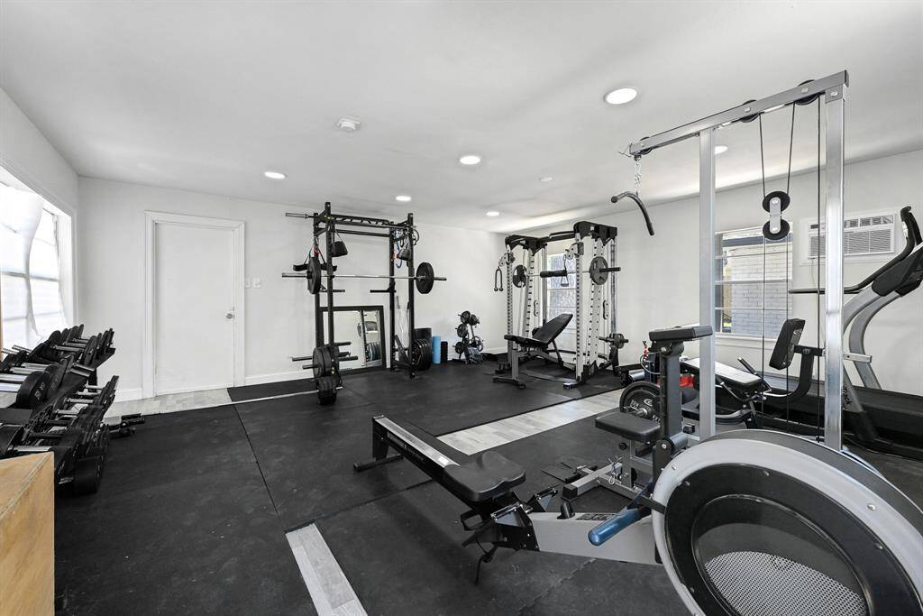 Additional living space currently a Home Gym with AC