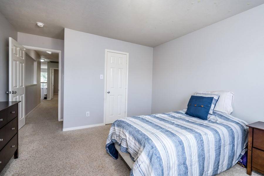 Another secondary bedroom with a very generous walk in closet.