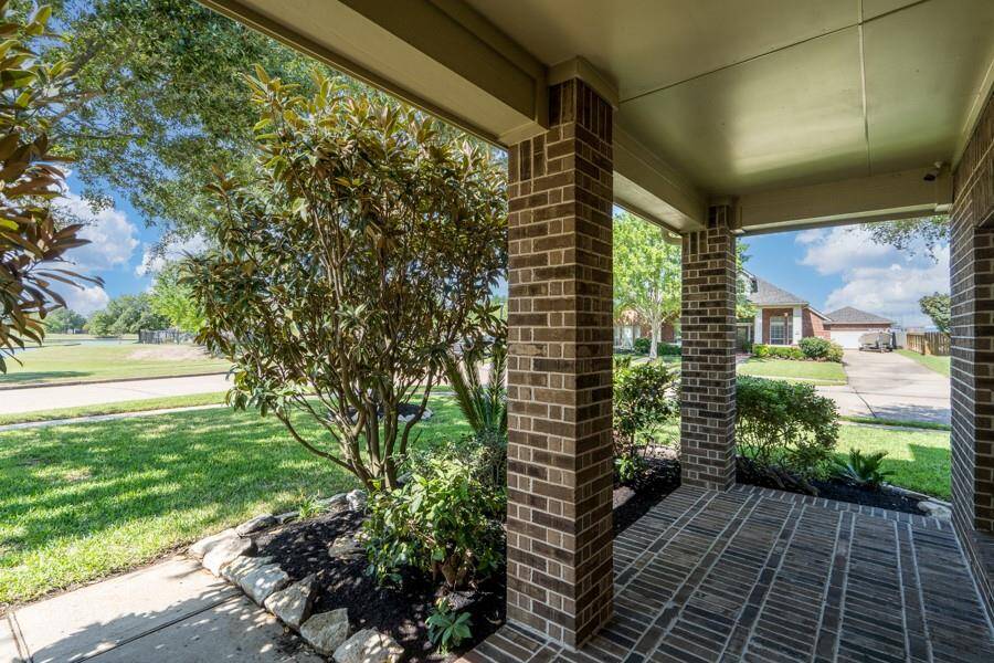 The inviting covered porch welcomes family to your new home.