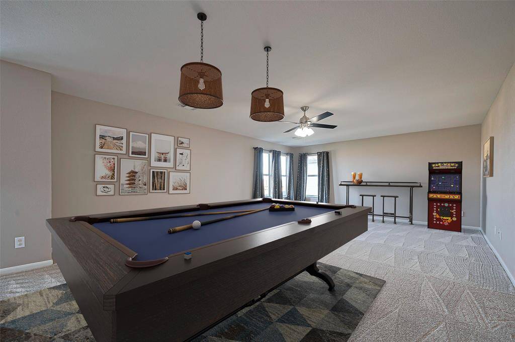 Massive game room at the top of the stairs with plush premium carpet throughout the 2nd floor