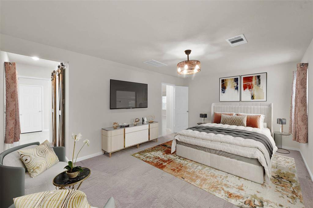Primary bedroom virtually staged.