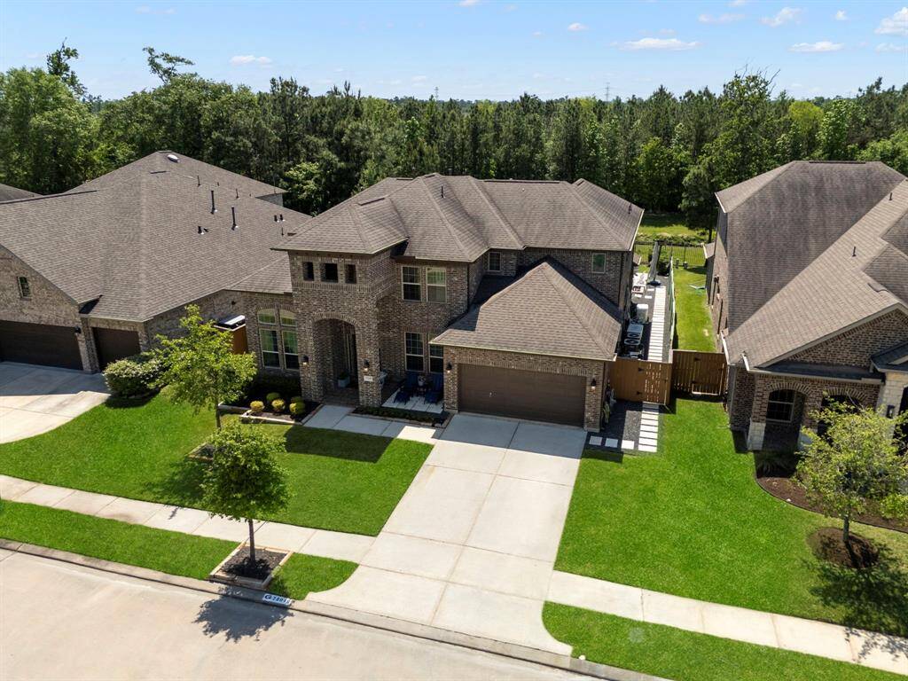 Incredible home located in the gated Allegro section of Harmony featuring a private backyard with pool/spa, outdoor kitchen, and a fantastic green space behind.