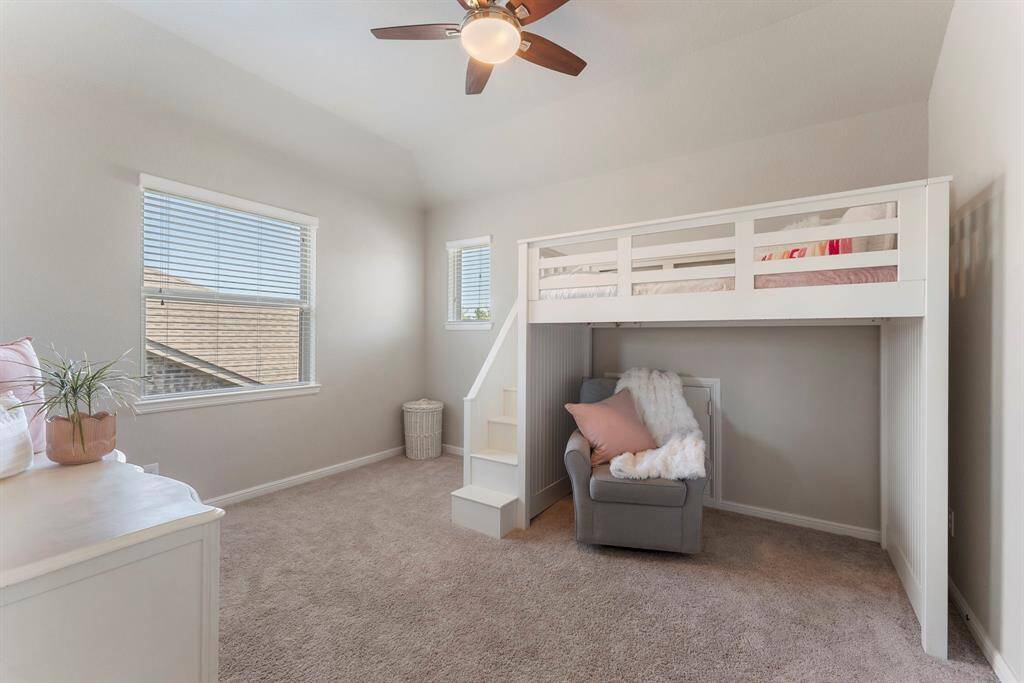 One of 3 bedrooms on second floor. This one shares a Jack and Jill bathroom.
