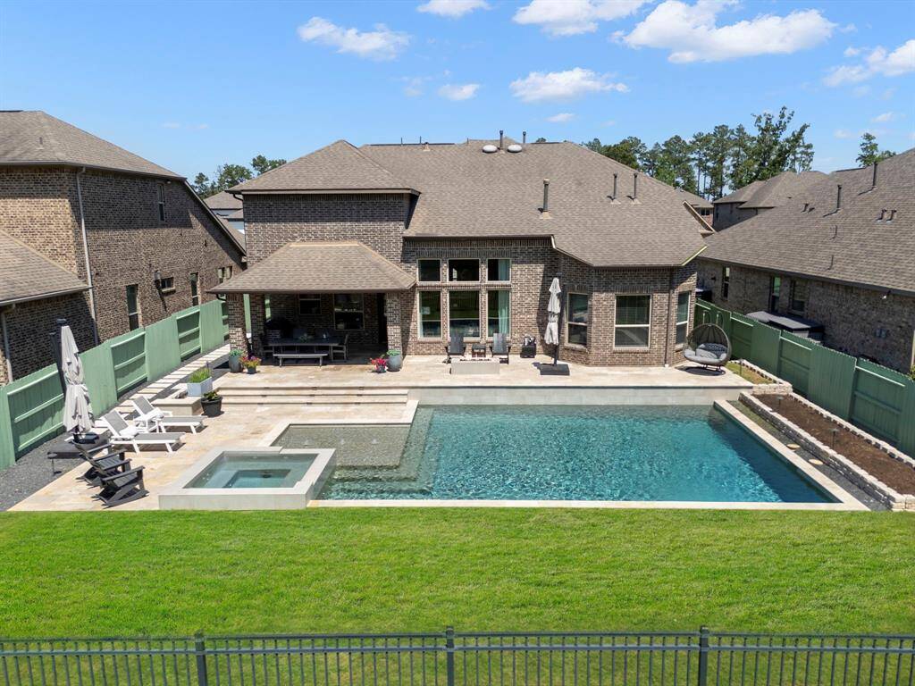 Premium lot in Harmony.  Owners were building during Harvey and had no issues with flooding.
