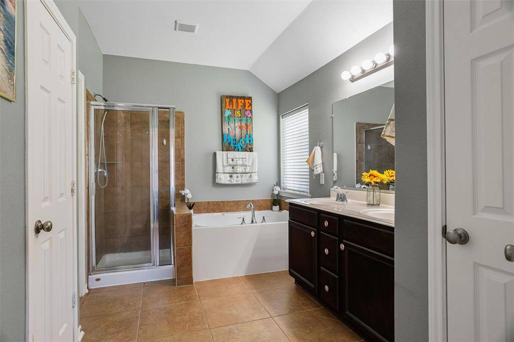 Primary bathroom with walk in closets