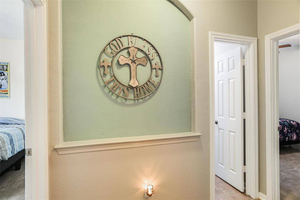 Hallway between secondary bedrooms