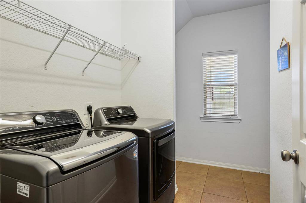 Large Laundry room with pantry and built in desk
