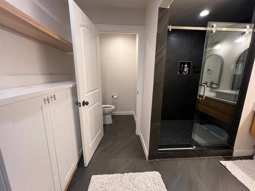 Primary Bath with Storage, Separate Shower and Private Toilet