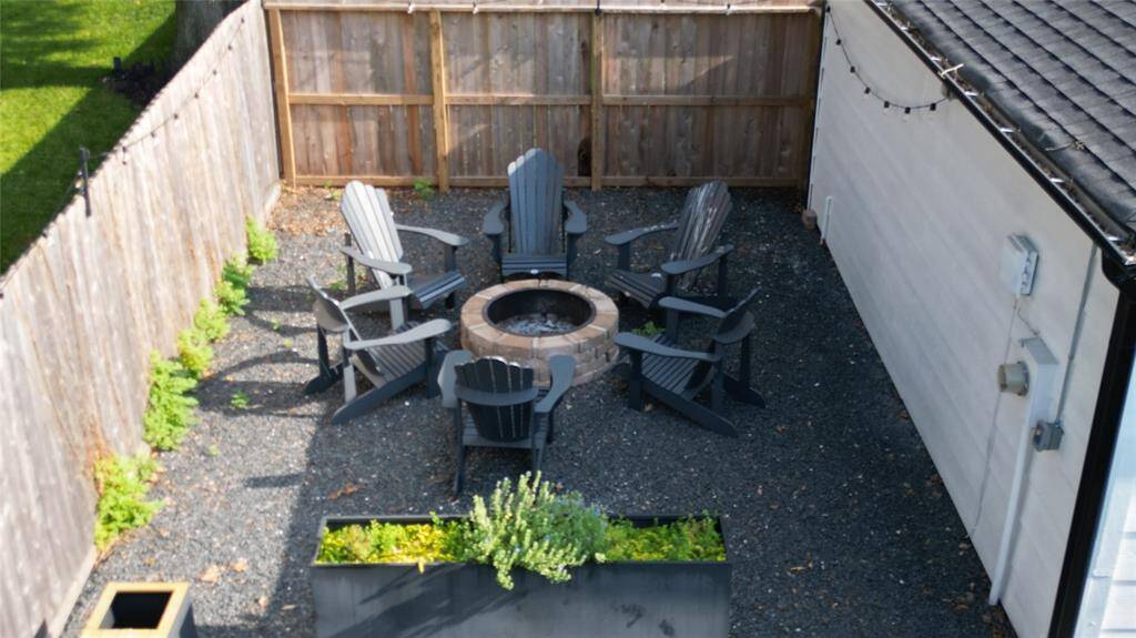 Composite Adirondack Chairs and Built-in Fire Pit