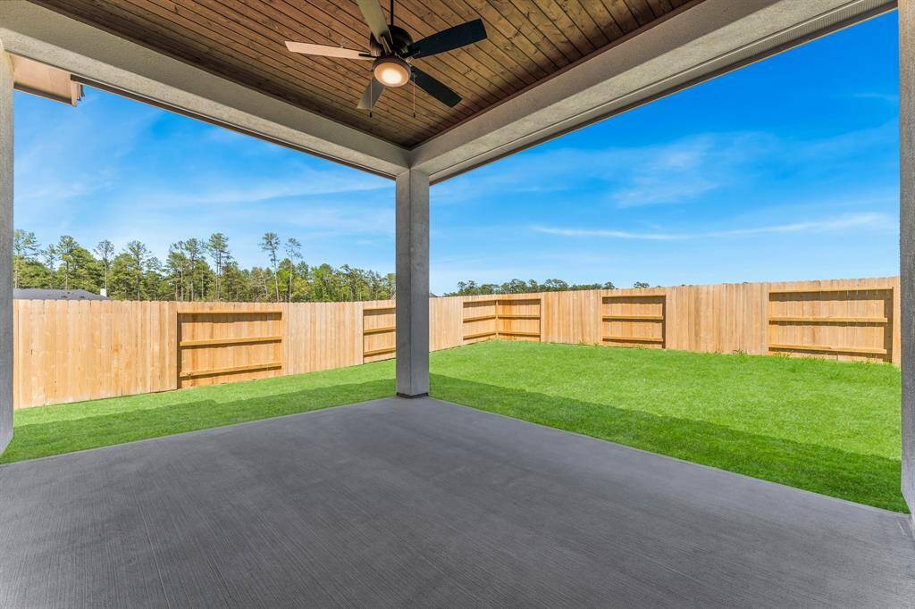 Enjoy you Back Yard While Lounging on the Covered Rear Patio.
