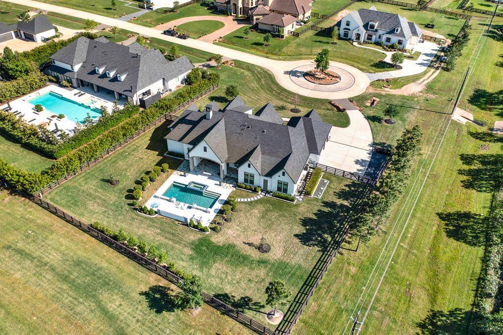 Meticulously landscaped lot with intentional design.