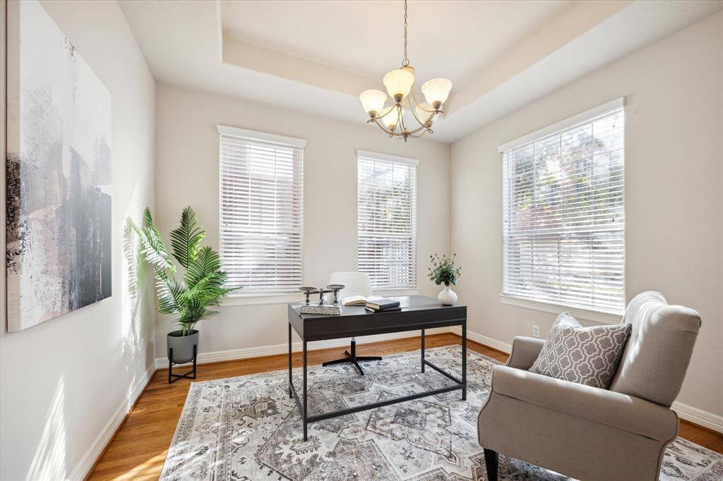 This is the formal dining room but could also be used as an office or secondary living space.
