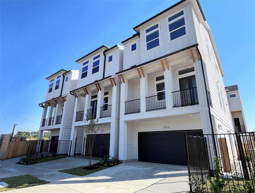 Discover your new modern oasis! This sleek, contemporary home boasts expansive windows, a spacious garage, and a stylish facade, perfect for your lifestyle.