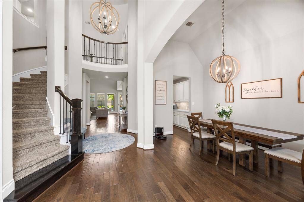 Rotunda and curved stairway offer a touch of elegance