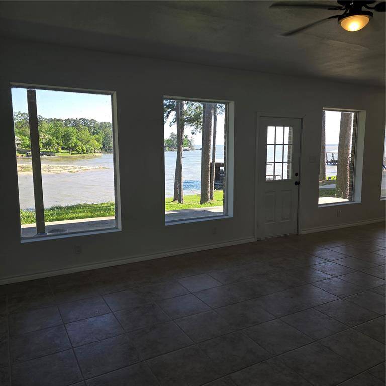 GAMEROOM WALL OF WINDOWS OVER LOOKING THE LAKE