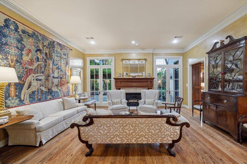 Living Room is adjacent to the kitchen and opens via pocket doors to the library.