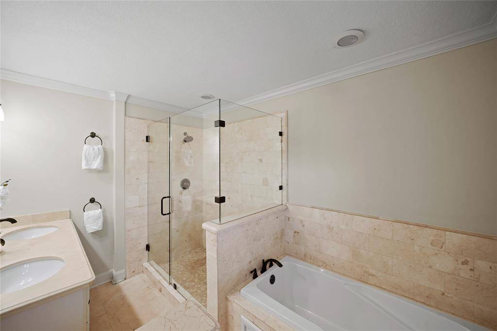 A seamless glass oversized shower.