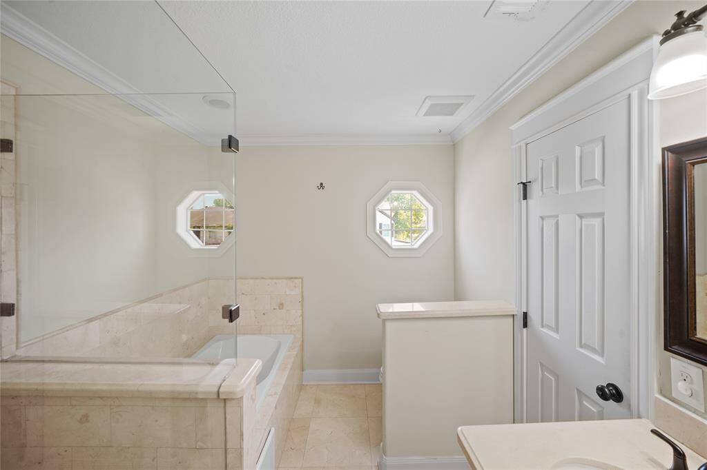 A separate tub and shower.