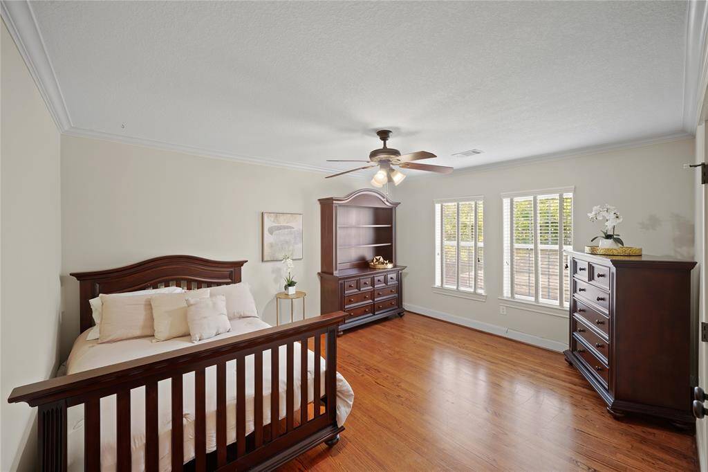 Spacious Bedroom 3 is located upstairs in the center.