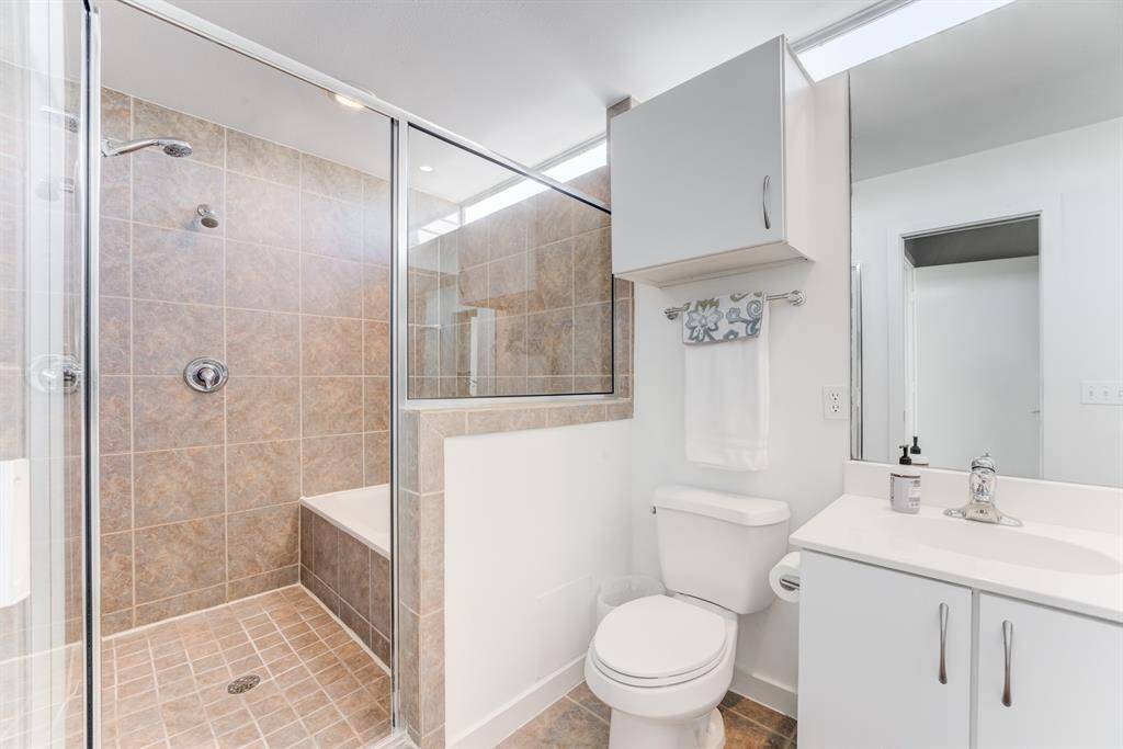 Primary bathroom boasts his and her sink, with garden tub and separate walk-in shower!