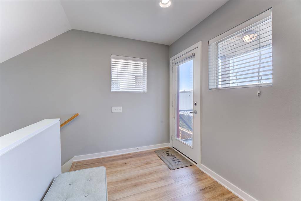 2nd floor landing opening up to the spacious balcony to enjoy the outdoors!