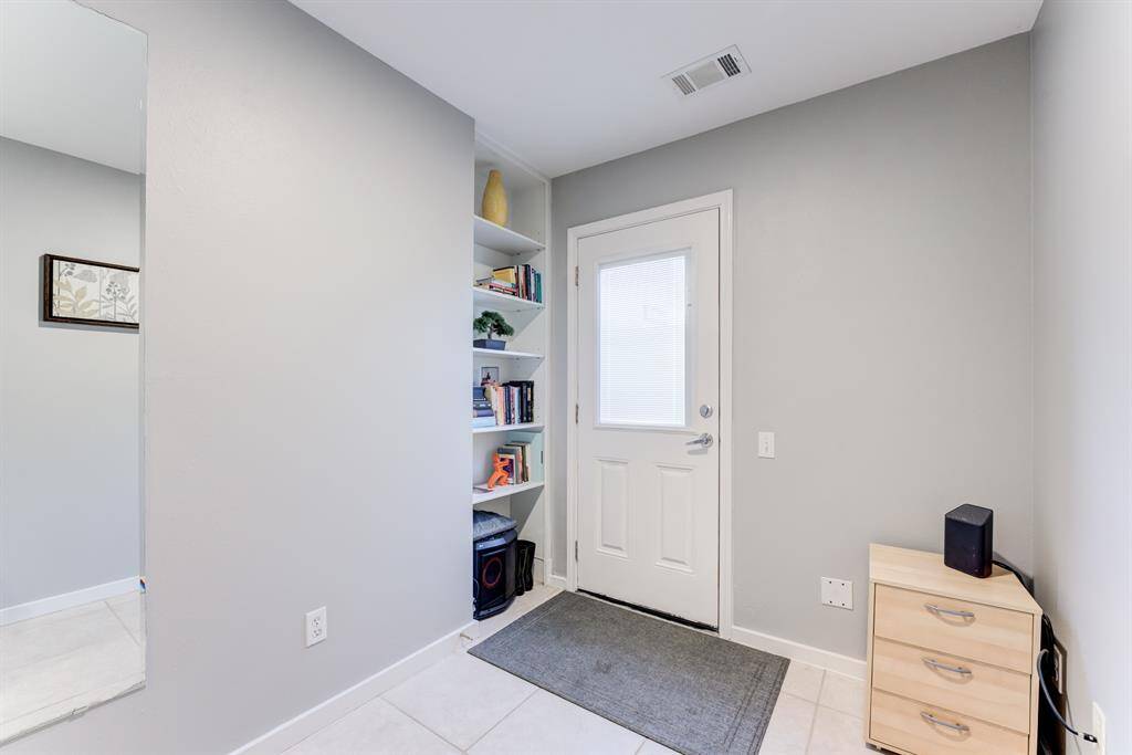 Utility Room / Office on 1st floor, leading out to the back patio!