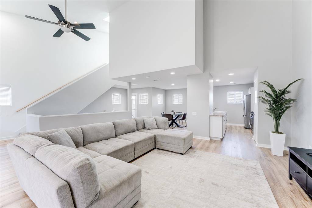 Large living room on the 2nd floor, perfect for entertaining and full of natural light! Look at the open space! Perfect for entertaining, with seamless flow to the kitchen and upstairs!