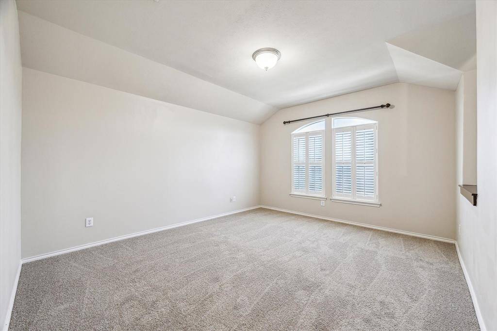 Large game room on the 3rd floor, near the primary bedroom.  This would make a great game room, office/study for working from home, workout space, or could even be converted to a 3rd bedroom!