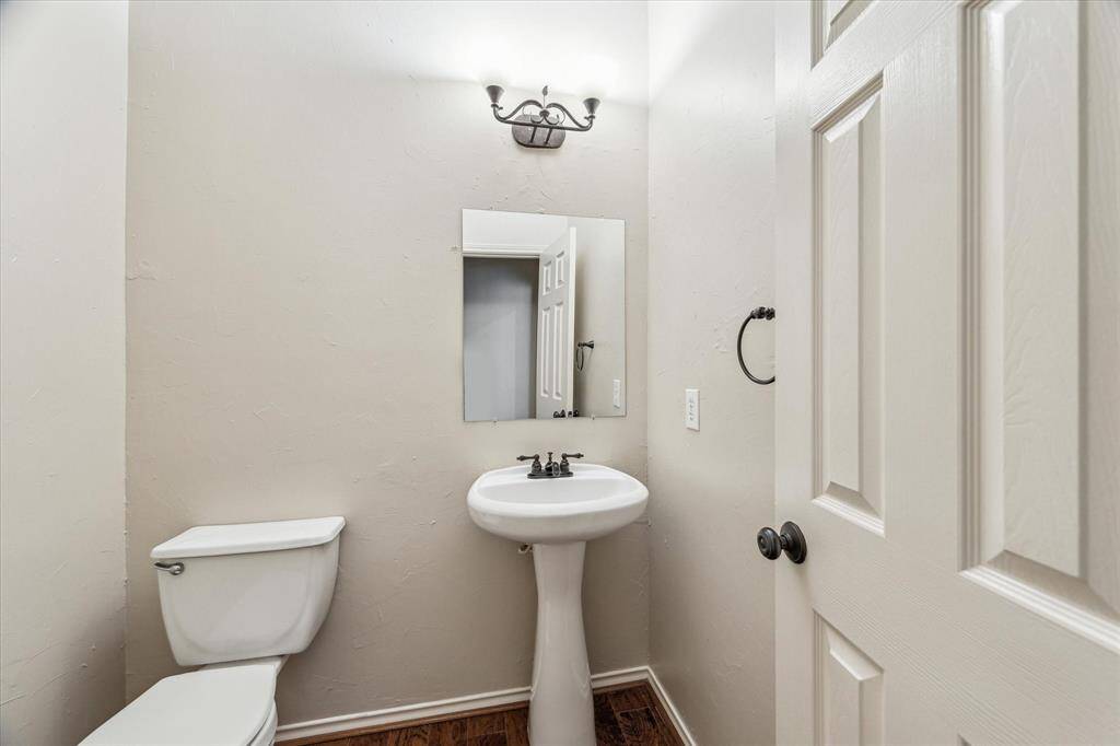 Half bath, conveniently located on the second floor, but tucked away for privacy!