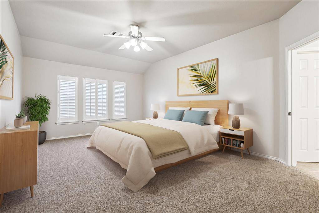 Huge primary bedroom with plantation shutters and great natural light!  And all carpet in the house was just replaced (April 2025)!*virtually staged*