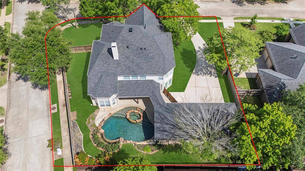 Situated on a large corner lot, offering space and privacy!