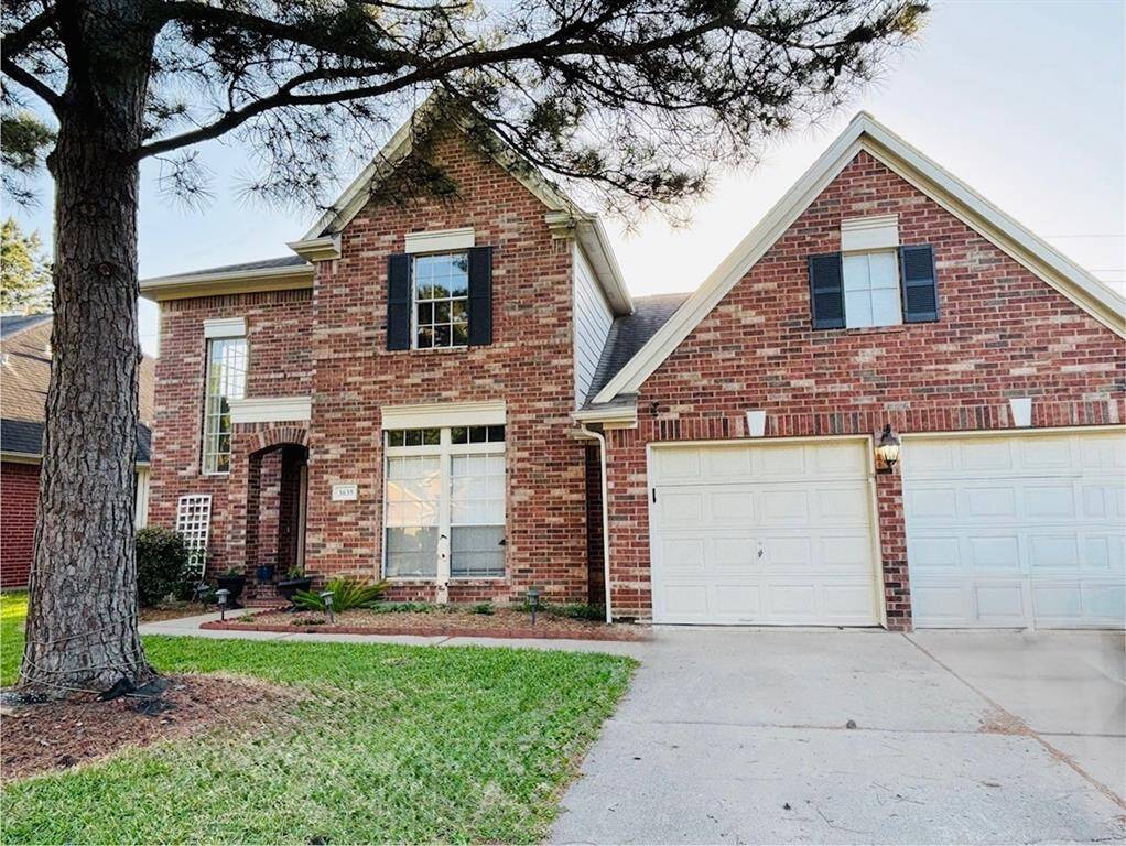 Welcome home to 3635 Lauderwood Ln in the north Katy subdivision of Westfield Terra.
