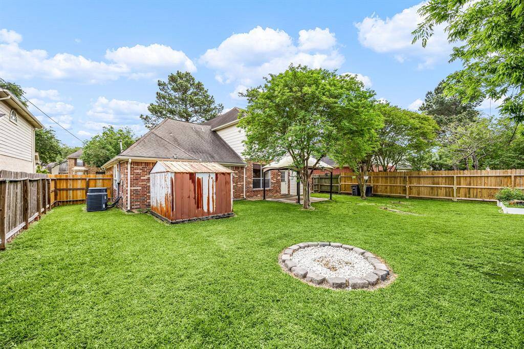 Another view of the large backyard in this peaceful subdivision.
