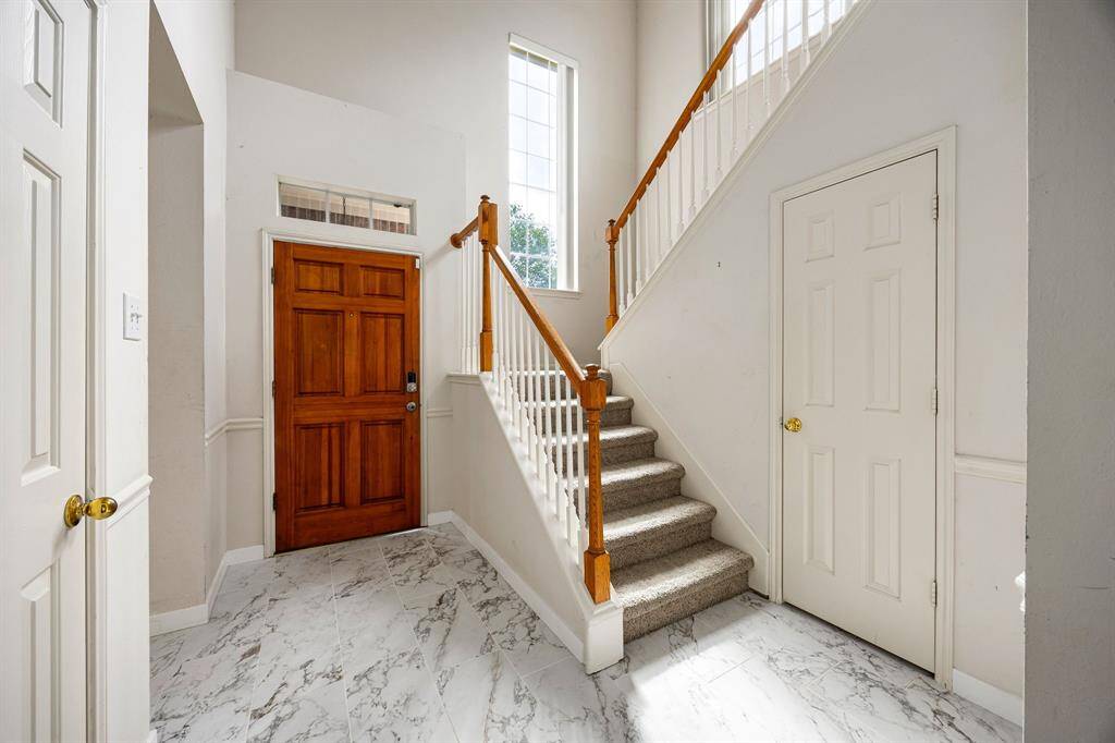 Front entrance has updated floors.
