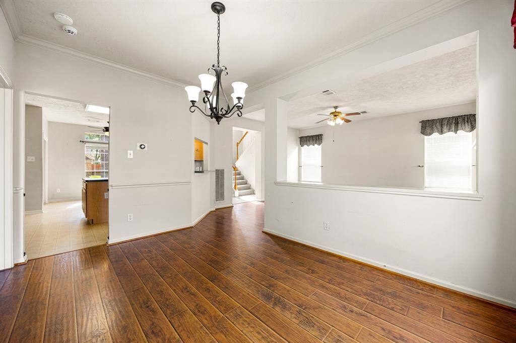 Living room view looking toward the front entrance.