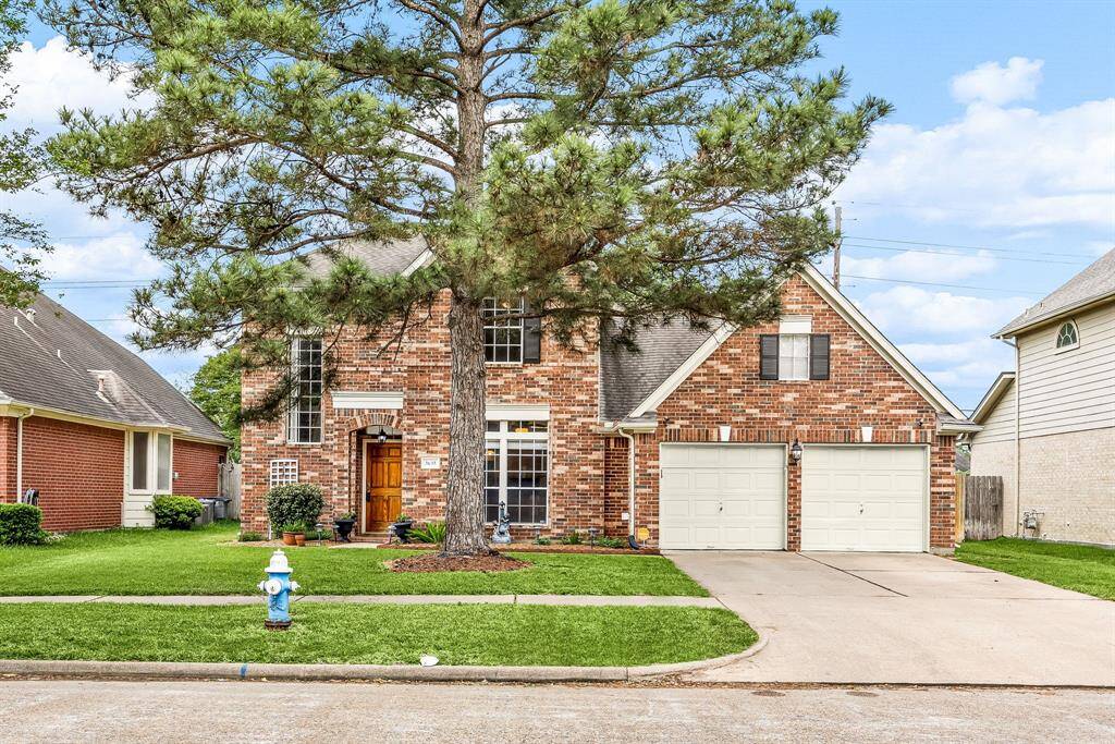 Three bedroom, two and half bathroom home with large backyard, gameroom upstairs and so much more!